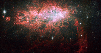 Formación estelar en la galaxia enana NGC 1569 NASA (FOTO: UNC).