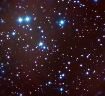 Fotografía astronómica combinada en X, óptico y radio del magnetar (punto de color rosa en el centro de la imagen). Crédito: Swift, Chandra, XMM-Newton, William Herschel Telescope, Plateau de Bure.