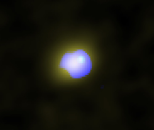 Imagen de ALMA de la galaxia distante J1243 + 0100 que alberga un agujero negro supermasivo en su centro./ALMA (ESO / NAOJ / NRAO), Izumi et al.